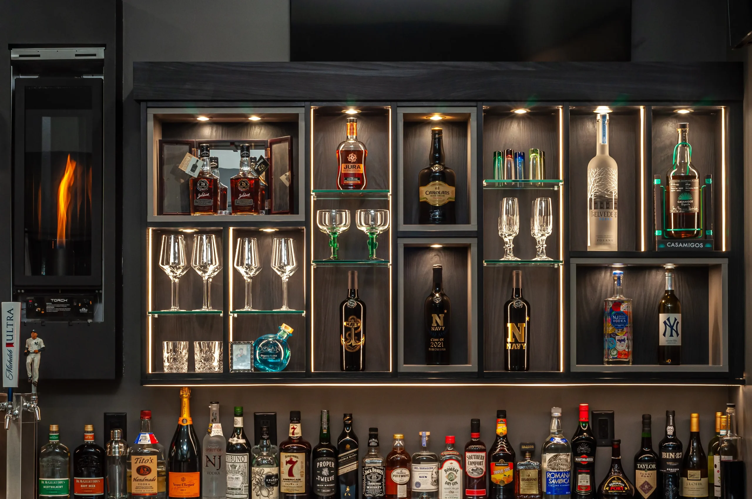 Bar cabinets with different variety of alcohols present in the wardrobe