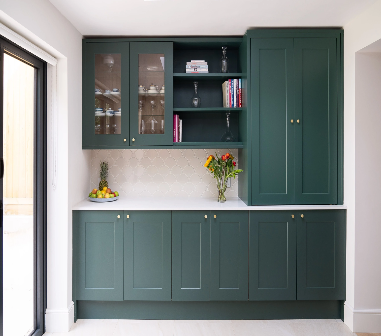 Green color cabinets and wardrobe in home interiors