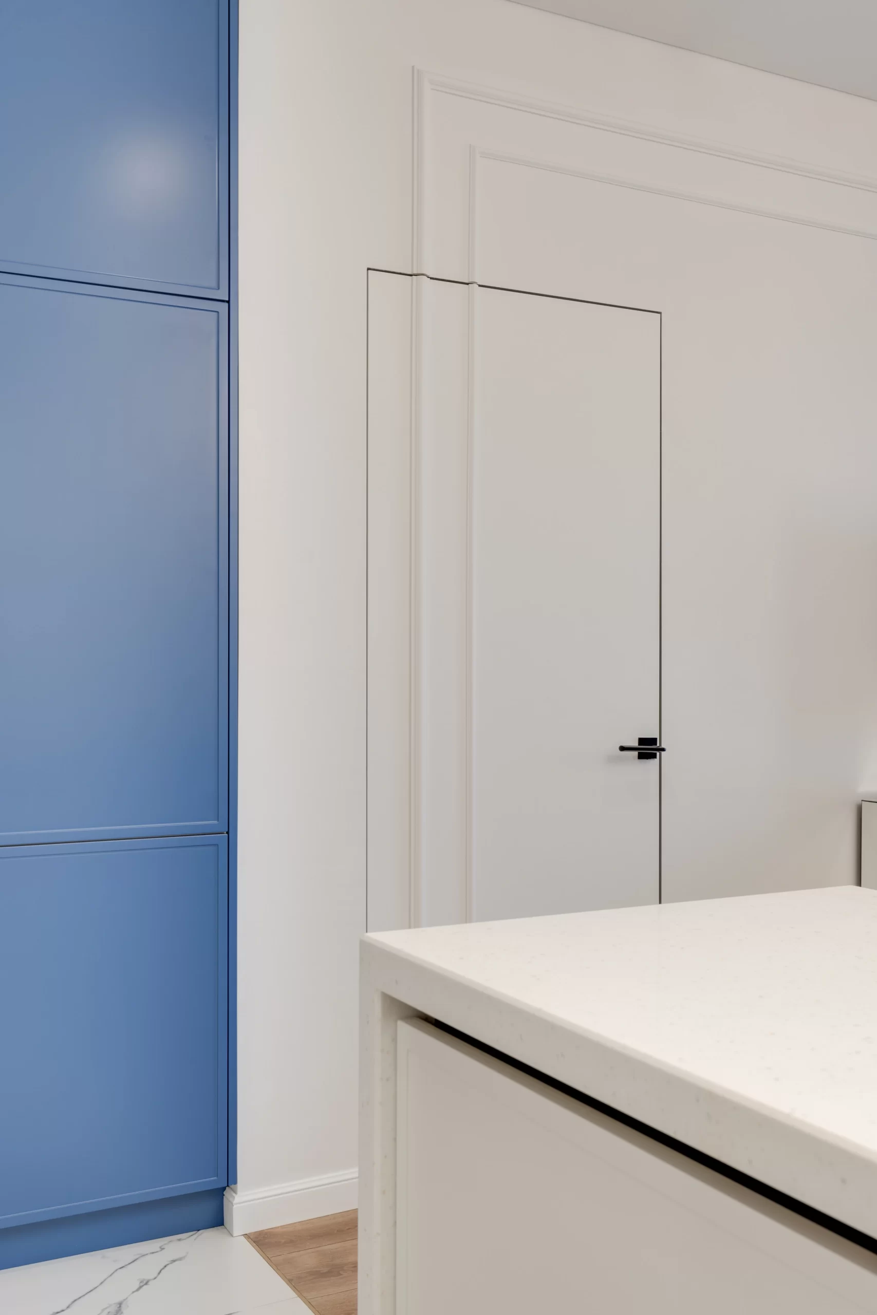 a door witha blue cabinets