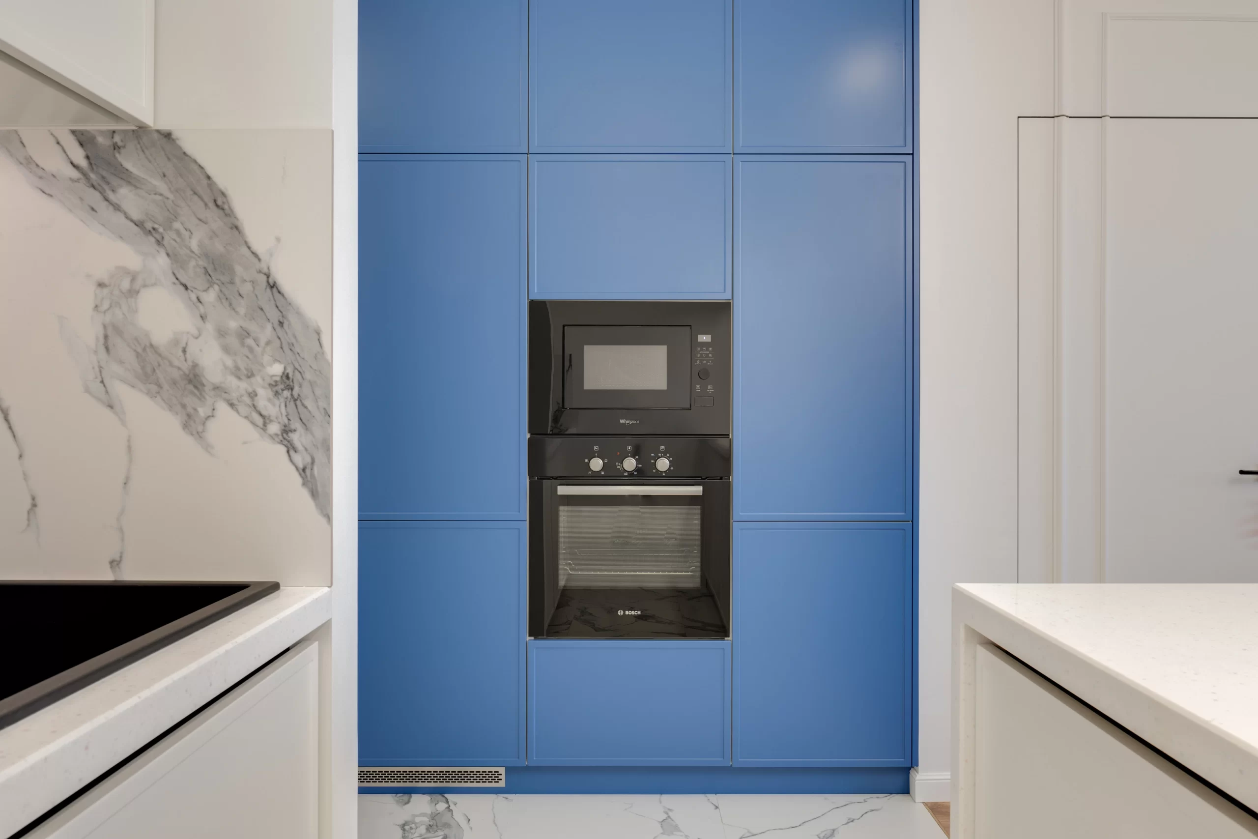 Microwave and oven placed in the wall cabinets